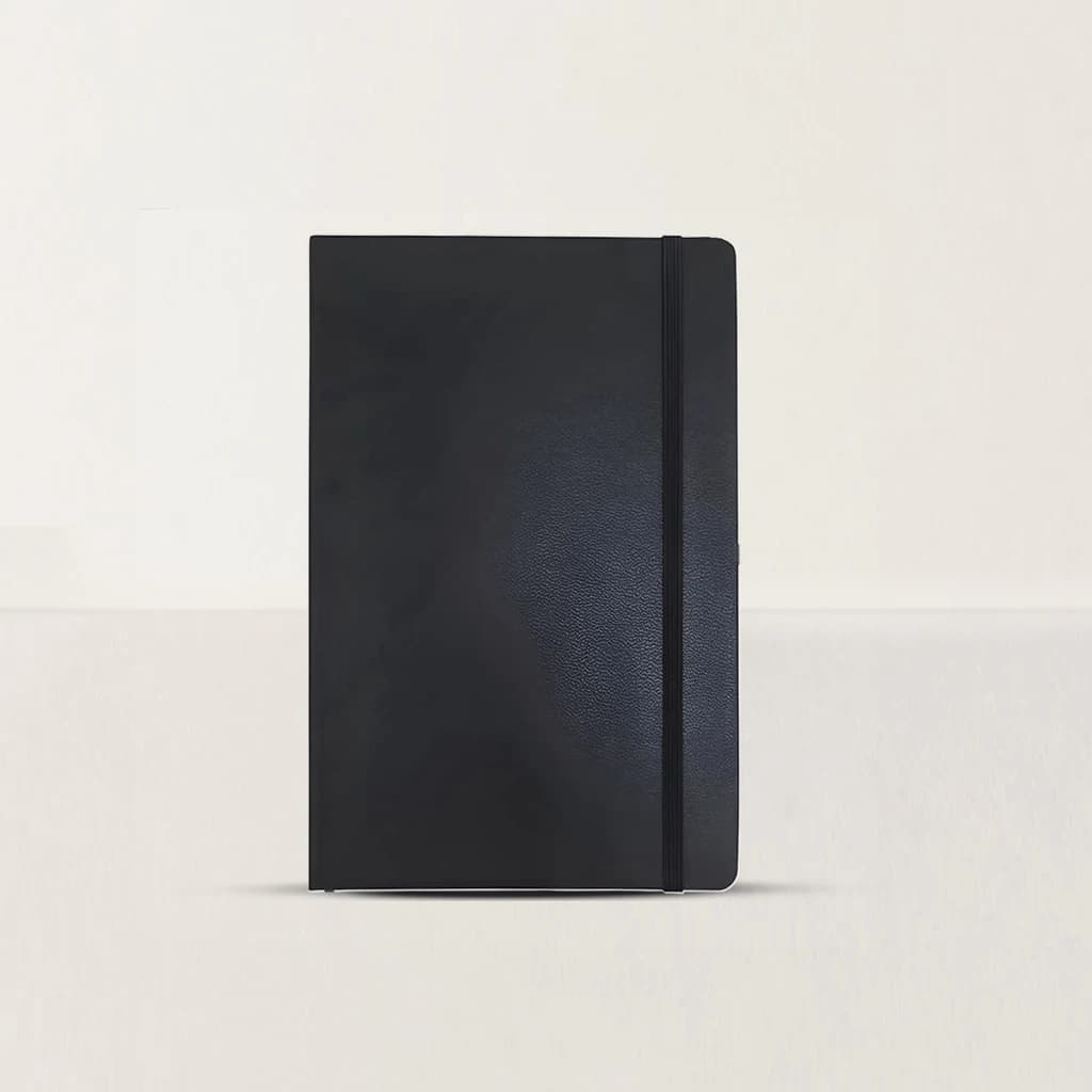 Caderno moleskine preto para escrita terapêutica